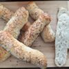 Delicious Schwäbische Seelen, freshly baked and arranged on a wooden board, showcasing their golden-brown crust and inviting appearance